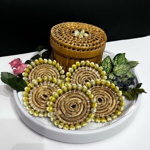Handcrafted Woven Basket with Floral Decor